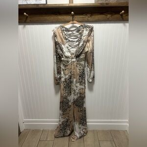 Blithe Los Angeles long sleeved, back tie, waist cutout wide leg jumpsuit sz M